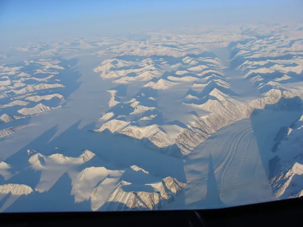 Mighty icebergs with equally impressive shadows: Greenland enroute to Vancouver.